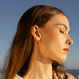 14k Waterdrop Diamond Huggie Earrings