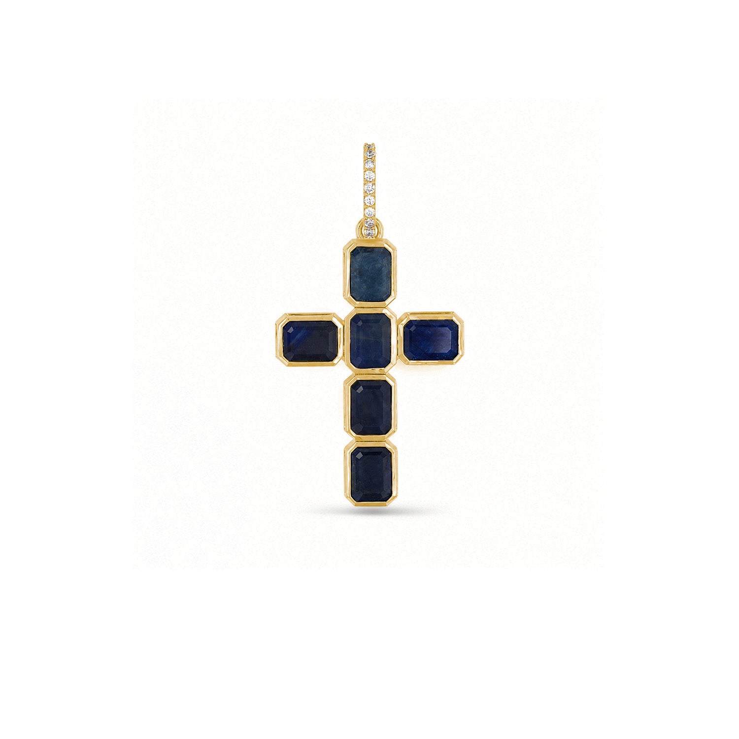 A gold cross pendant featuring five bezel-set rectangular dark blue sapphire gemstones, with a row of diamonds along the bail, shown on a plain white background.